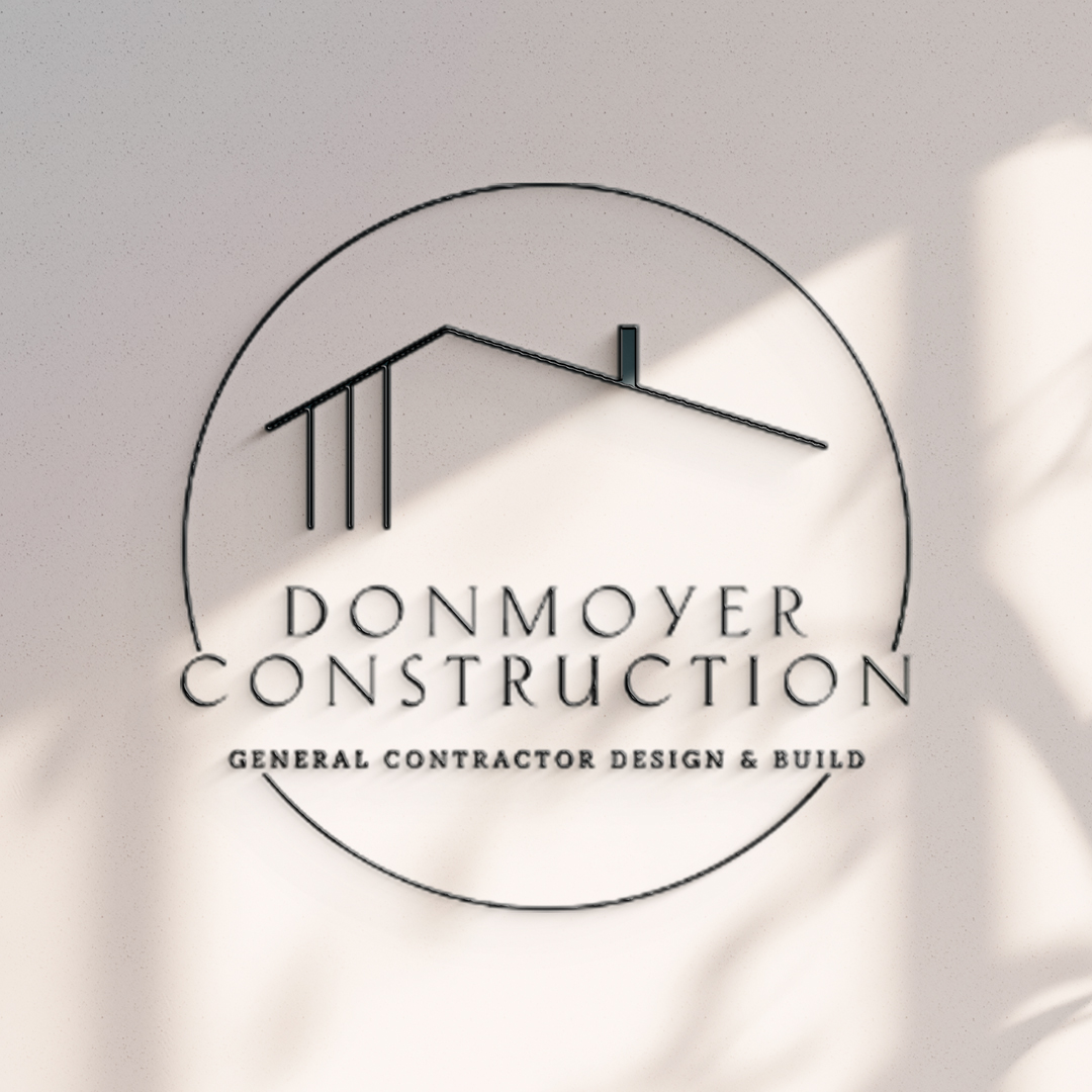 Donmoyer Construction identity with architectural roofline mark